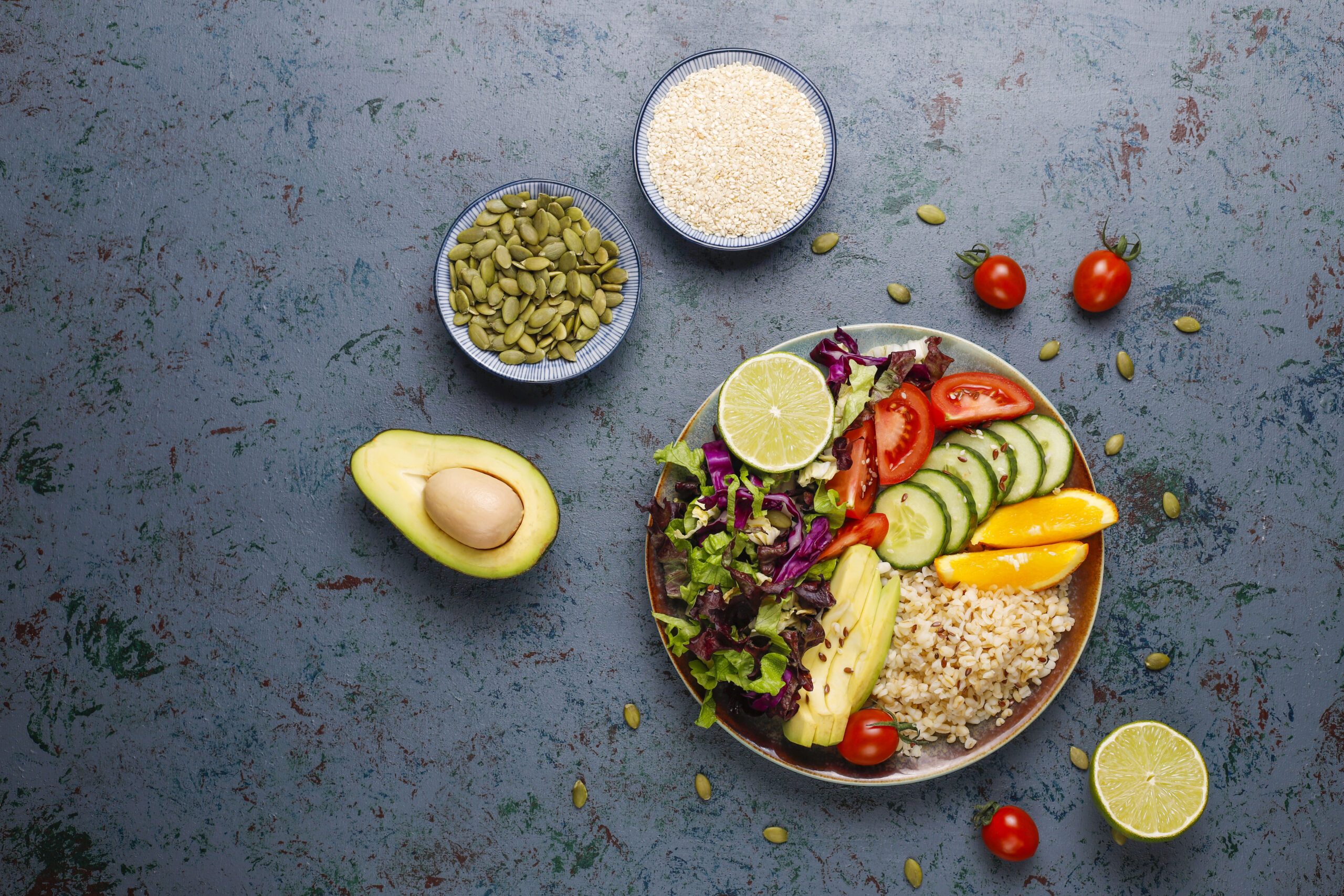 Healthy vegetarian balanced food concept,fresh vegetable salad, buddha bowl on dark background